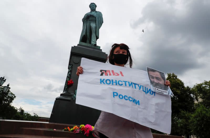 A woman protests against amendments to Russia's Constitution in Moscow