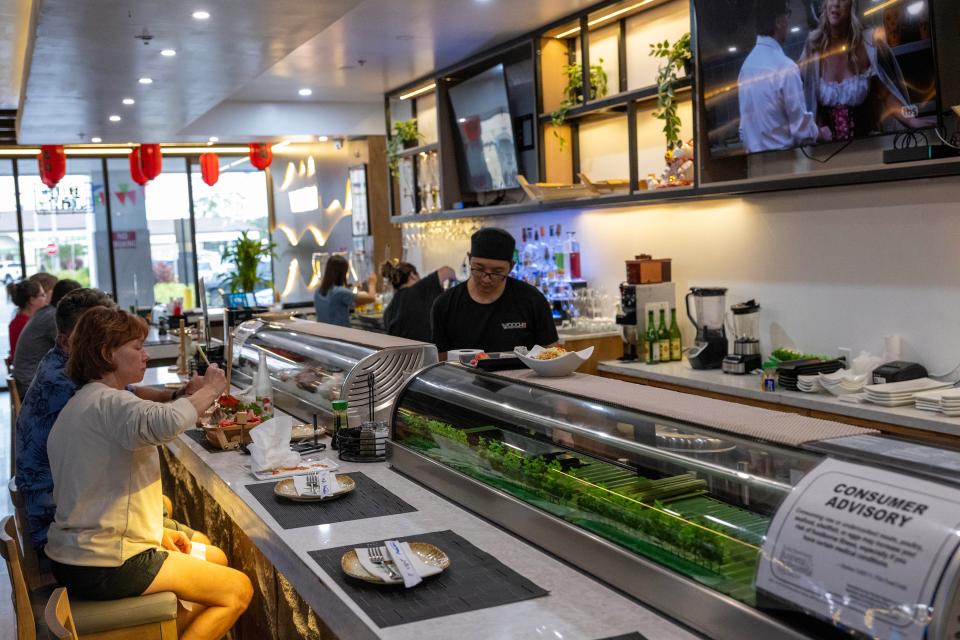 Customers can sit at the bar and watch their sushi chef create extravagant, brightly colored sushi and sashimi at Kawachi Sushi & Bar in Leesburg.