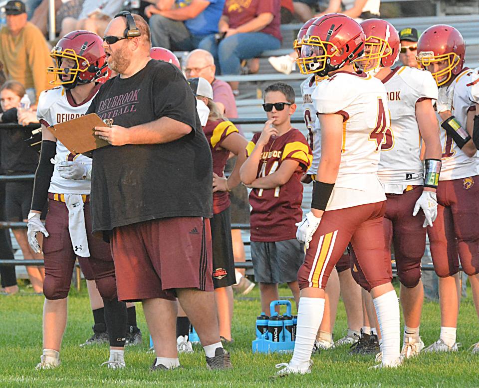 Deubrook Area head coach Nathan Lamb looks on from the sidelines during a high school football game against Great Plains Lutheran on Friday, Sept. 1, 2023 at Watertown Stadium.