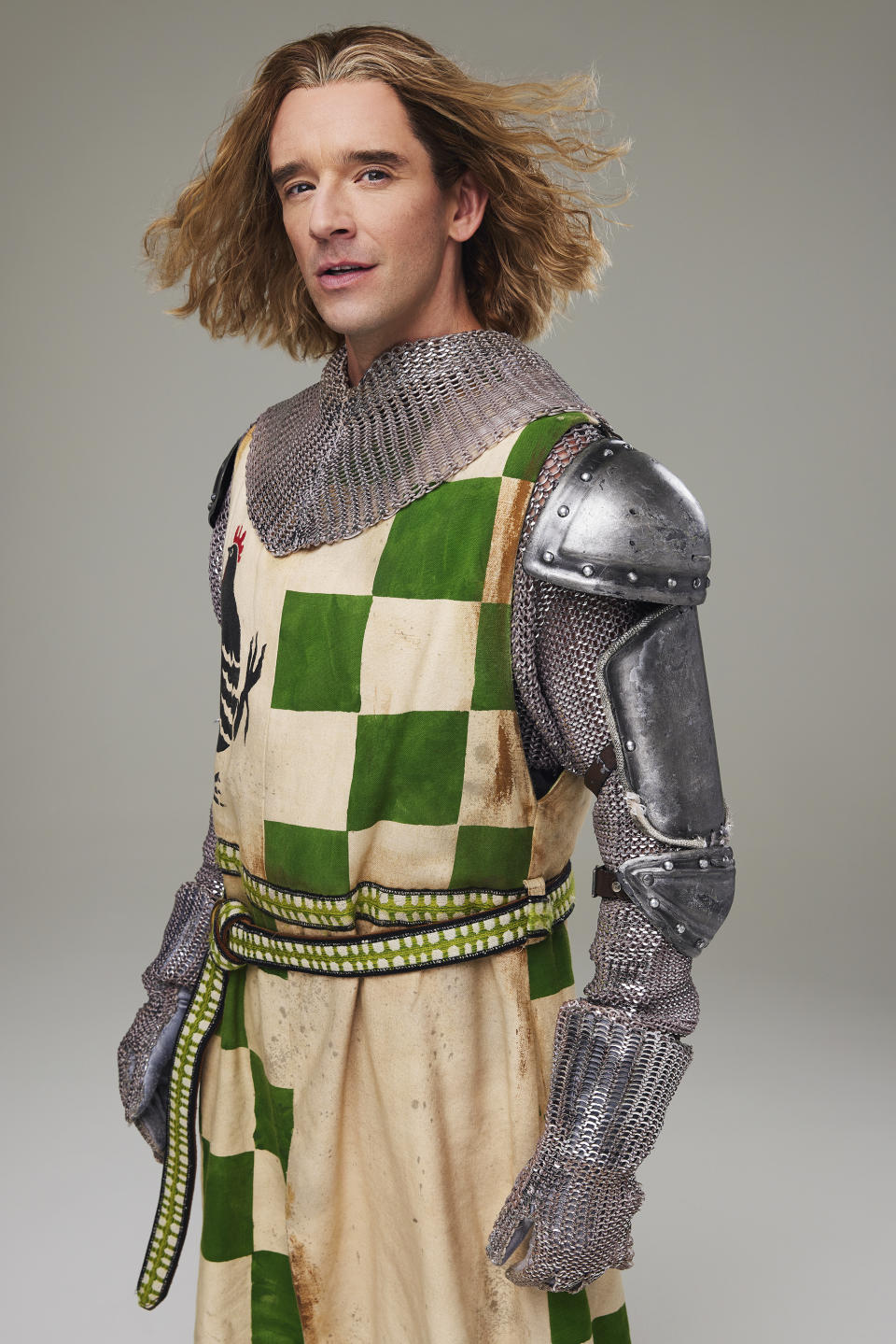 This image released by Polk & Co. shows actor Michael Urie in costume for his role in "Spamalot." (Matthew Murphy/Polk & Co. via AP)