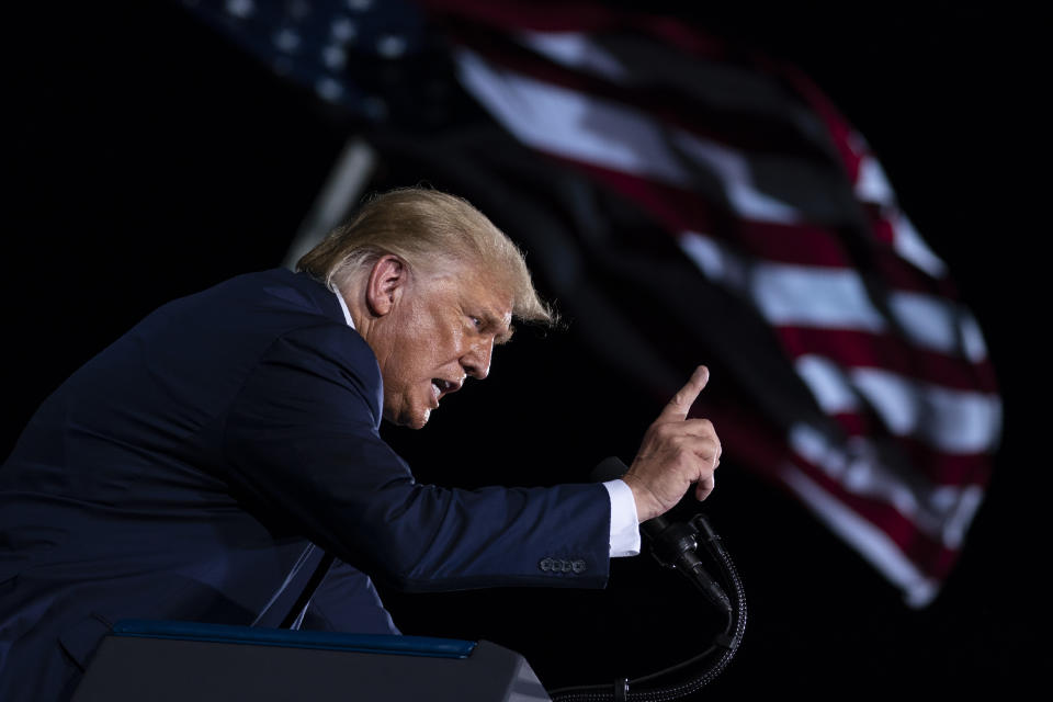 President Donald Trump speaks during a campaign rally at Cecil Airport, Thursday, Sept. 24, 2020, in Jacksonville, Fla. (AP Photo/Evan Vucci)