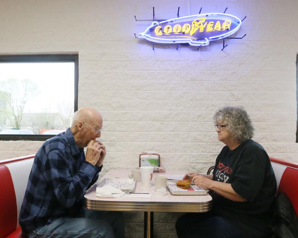 Orman Shields enjoys lunch with his daughter, Teresa Stillman, at Wink's Drive-In last week.