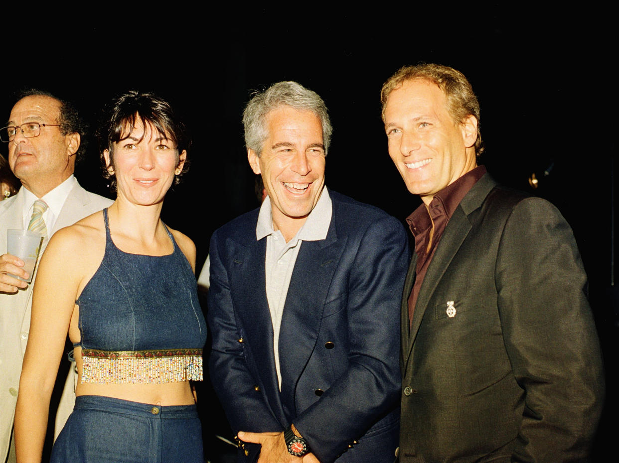 (L-R) Ghislaine Maxwell, Jeffrey Epstein, and musician Michael Bolton pose for a portrait during a party at the Mar-a-Lago club, Palm Beach, Florida, February 12, 2000. (Photo by Davidoff Studios/Getty Images)