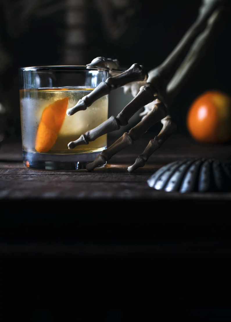 <p>One tequila, two tequila...</p><p>Get the recipe from <a href="https://honestlyyum.com/17618/oaxaca-old-fashioned-happy-halloween/" rel="nofollow noopener" target="_blank" data-ylk="slk:Honestly Yum;elm:context_link;itc:0;sec:content-canvas" class="link ">Honestly Yum</a>.</p>