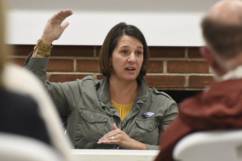 Jess King, a Democratic candidate for Congress in Pennsylvania's 11th District, responds to a question at a town hall meeting at a recreation center on Friday, Nov. 2, 2018 in Red Lion, Pa. Voters in the heart of Pennsylvania's rolling dairy farms and Amish countryside have rarely seen a Democrat mount a competitive campaign for Congress. From all appearances, King is giving freshman Republican U.S. Rep. Lloyd Smucker a fight to the finish in Tuesday's election in this conservative district. (AP Photo/Marc Levy)