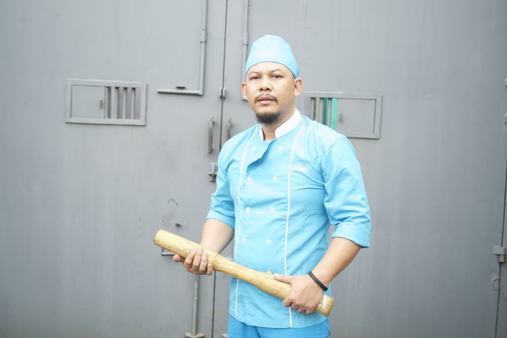 A prison cook from the Cipinang Penitentiary Institution in Jakarta, Indonesia, poses for a photograph during the shooting of the Discovery Channel documentary series, ‘Prison Food’. — Pix courtesy of Discovery Channel Asia