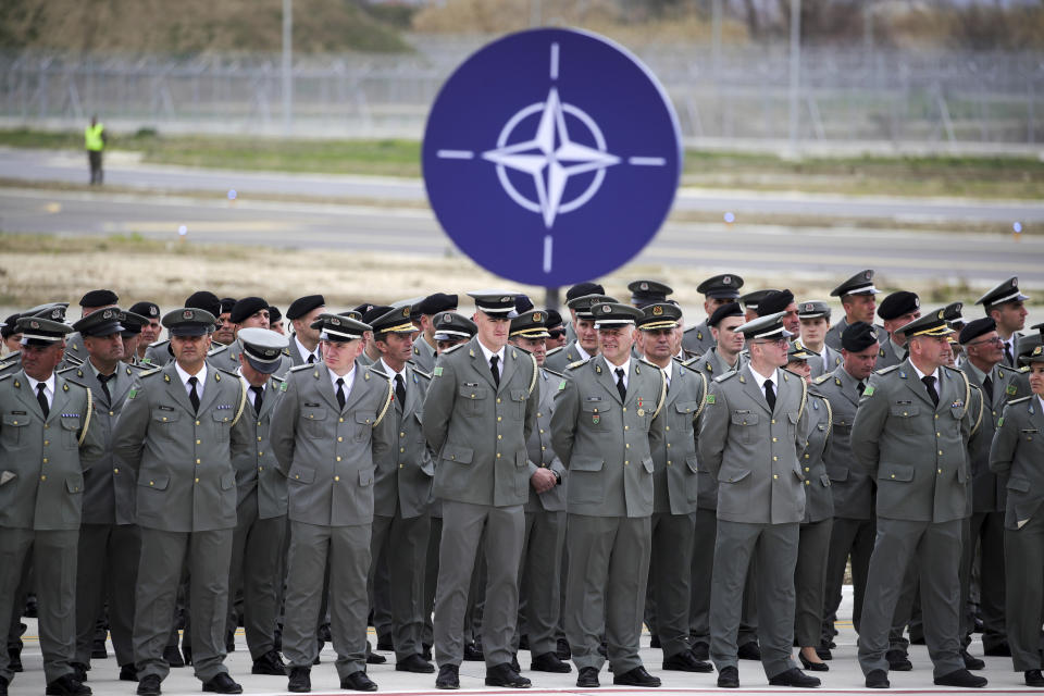 Military officers attend an inauguration ceremony at an airbase, in Kocuve, about 85 kilometers (52 miles) south of Tirana, Albania, Monday, March 4, 2024. NATO member Albania inaugurated an international tactic air base on Monday, the Alliance’s first one in the Western Balkan region. (AP Photo/Armando Babani)