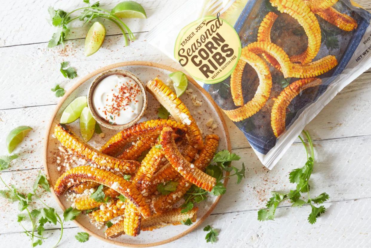 Trader Joe's seasoned corn ribs on a plate with dip