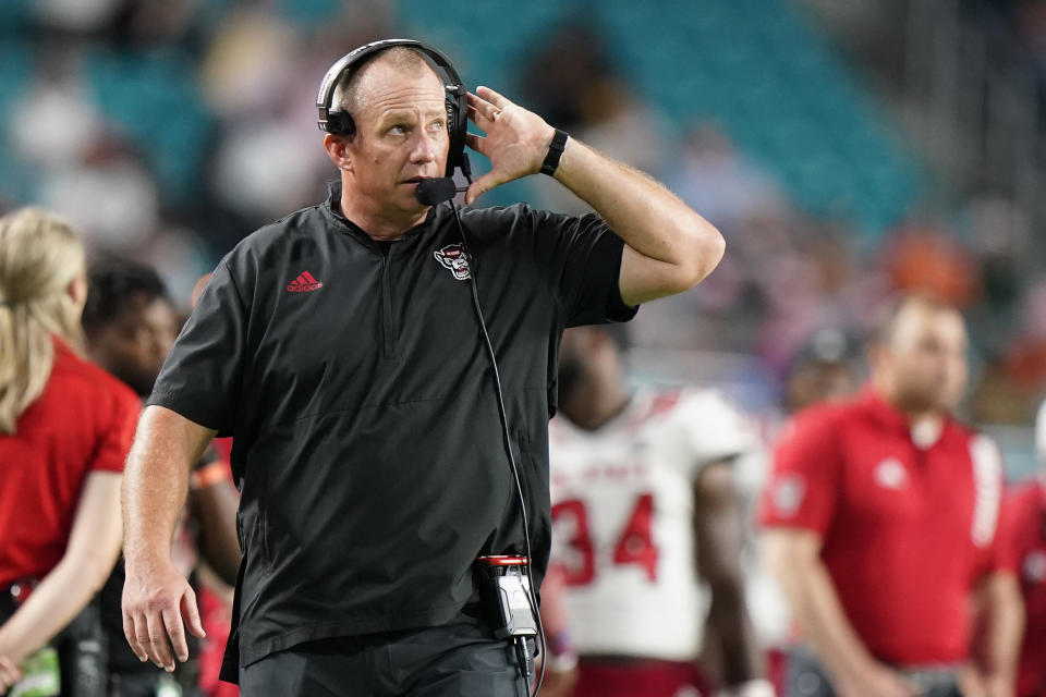 FILE - North Carolina State head coach Dave Doeren is shown during the first half of an NCAA college football game against Miami in Miami Gardens, Fla., Saturday, Oct. 23, 2021. East Carolina will host No. 13 North Carolina State on Saturday to open the season. (AP Photo/Wilfredo Lee, File)