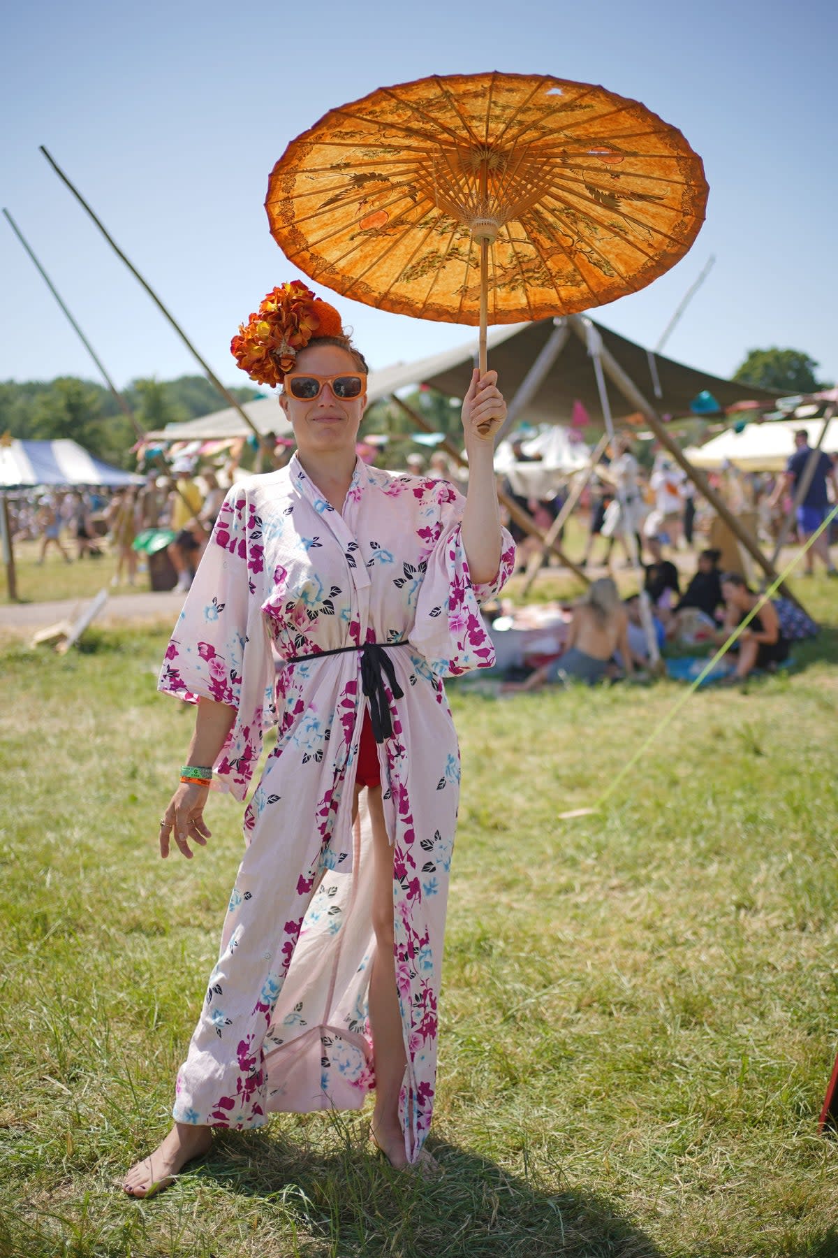 Festivalgoer Sophie Holloway, 35, from Devon, at the Glastonbury Festival (PA)