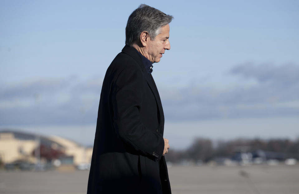 US Secretary of State Antony Blinken arrives board his aircraft prior to departure, Monday, Nov. 27, 2023, at Andrews Air Force Base, Md., as he travels to Brussels for a NATO Foreign Ministers meeting. (Saul Loeb/Pool via AP)
