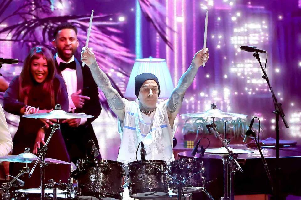 <p>Kevin Winter/Getty</p> Travis Barker performs at the 2023 Emmys in Los Angeles on Jan. 15, 2024