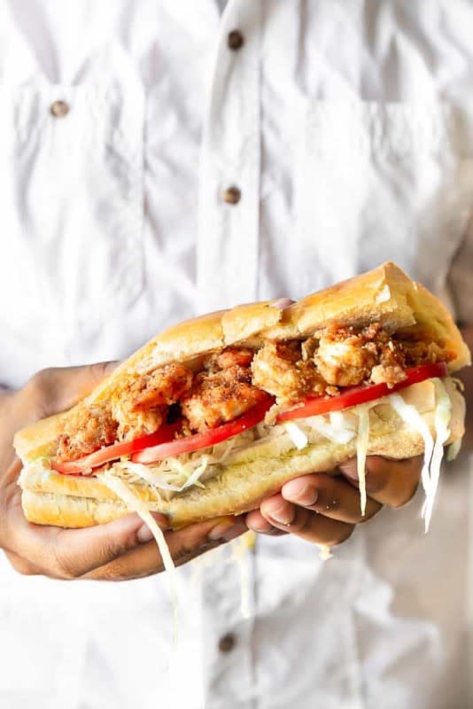 <p>Grandbaby Cakes</p><p>Crispy Cajun fried shrimp are piled on a French baguette and topped with a Creole-inspired creamy remoulade sauce, creating the most delicious and authentic po'boy you will ever taste outside of NOLA!</p><p><strong>Get the recipe: <a href="https://grandbaby-cakes.com/shrimp-po-boy/" rel="nofollow noopener" target="_blank" data-ylk="slk:Authentic New Orleans Shrimp Po' Boy with Creole Remoulade Sauce;elm:context_link;itc:0;sec:content-canvas" class="link rapid-noclick-resp">Authentic New Orleans Shrimp Po' Boy with Creole Remoulade Sauce</a></strong></p>