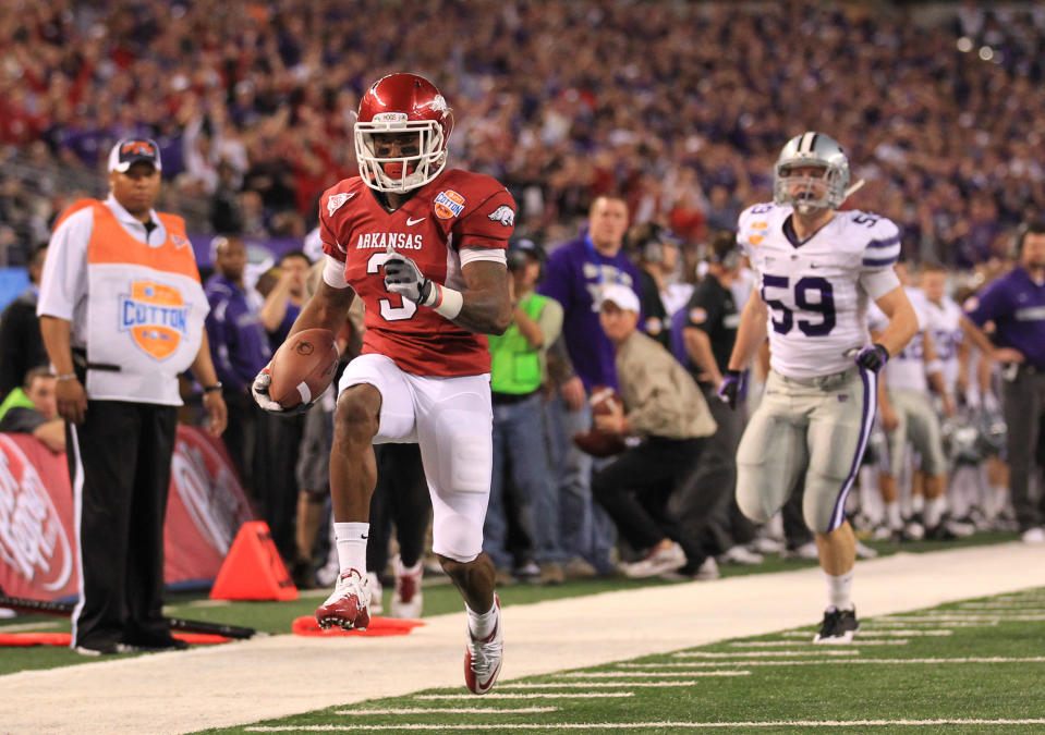 Jan 6, 2012; Dallas, TX, USA; Arkansas Razorbacks receiver Joe Adams (3) returns a punt for a touchdown during the second quarter against the Kansas State Wildcats at the Cowboys Stadium. Mandatory Credit: Matthew Emmons-USA TODAY Sports