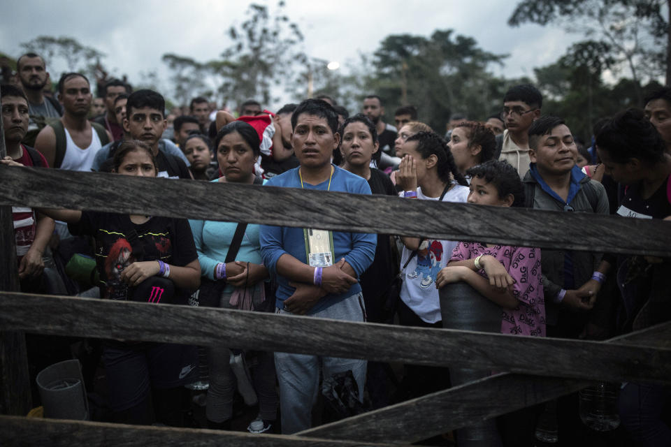 FILE - Migrants who plan to start walking across the Darien Gap from Colombia to Panama in hopes of reaching the U.S. gather at the trailhead camp in Acandi, Colombia, May 9, 2023. President-elect José Raúl Mulino said Thursday, May 9, 2024, he will shut down the migration route used by more than 500,000 people last year. Until now, Panama has helped speedily bus the migrants across its territory so they can continue their journey north. (AP Photo/Ivan Valencia, File)