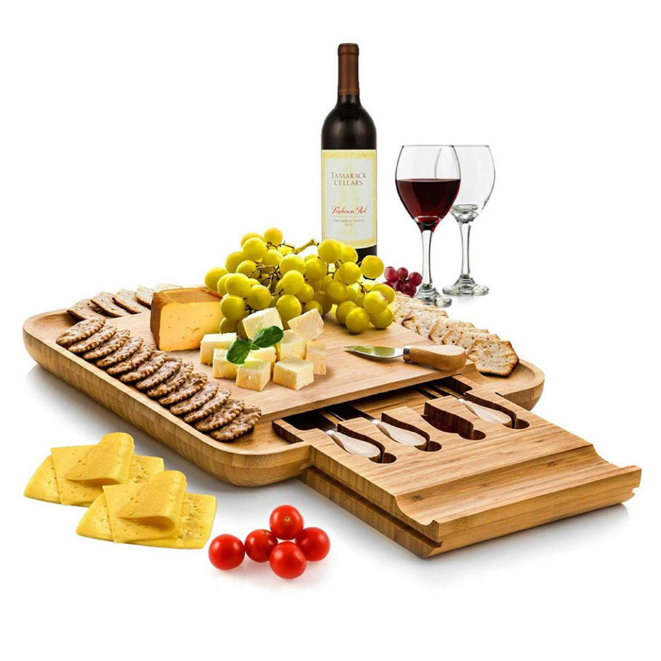 Bamboo Cheese Board with Cutlery Set. (Photo: Amazon)