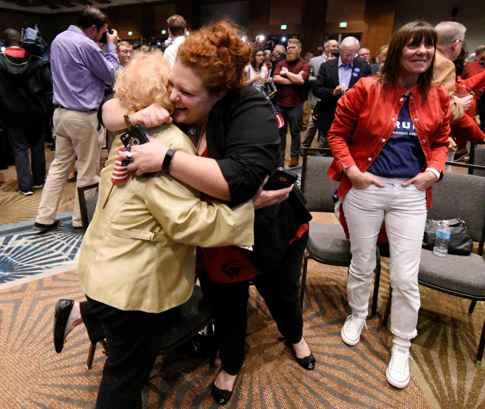 Supporters of U.S. Republican candidate Donald Trump celebrate after the networks called their candidate's victory in the state of North Carolina, at Republican Governor Pat McCrory's election-night party in Raleigh, North Carolina, U.S. Nov. 8.