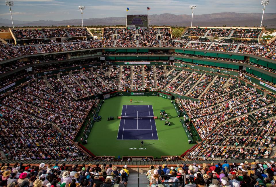 A packed stadium one watches Rafael Nadal of Spain take on Carlos Alcaraz of Spain during their ATP semifinal match of the BNP Paribas Open at the Indian Wells Tennis Garden in Indian Wells, Calif., Saturday, March 19, 2022. 