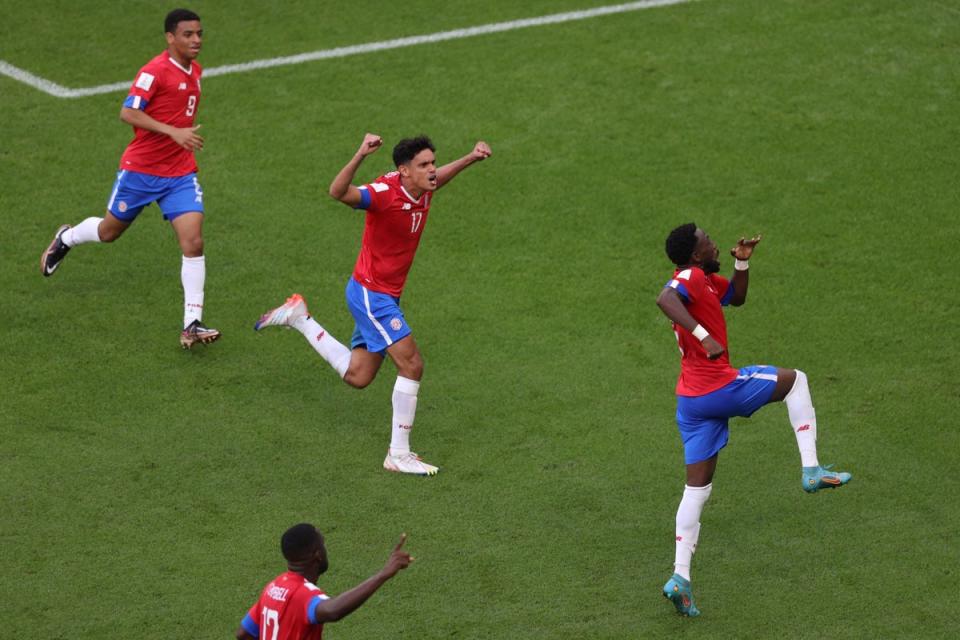 Fuller (right) celebrates with teammates (AFP via Getty Images)