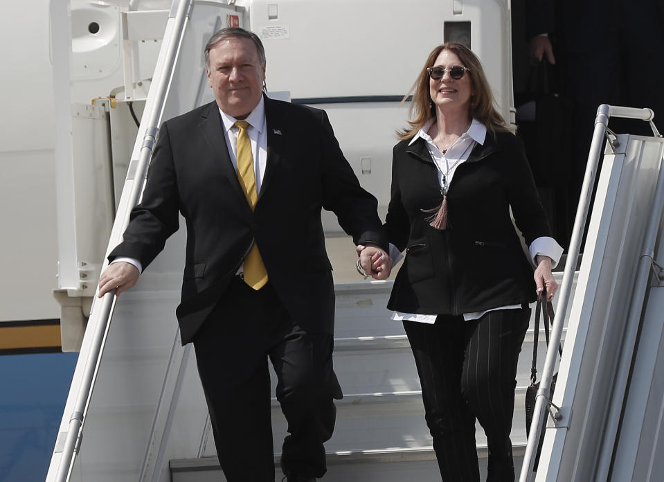 U.S. Secretary of State Mike Pompeo and his wife Suzan exit the plane as they arrive at Rafik Hariri international airport, in Beirut, Lebanon, Friday, March 22, 2019. Pompeo is in Beirut for a two day visit to meet with Lebanese officials. (AP Photo/Hussein Malla)