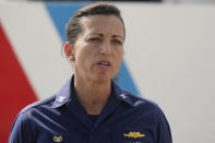 U.S. Coast Guard Captain Jo-Ann Burdian speaks during a news conference, Thursday, Jan. 27, 2022, at Coast Guard Sector Miami in Miami Beach, Fla. The Coast Guard says it has found four more bodies in its search for dozens of migrants lost at sea off Florida, for a total of five bodies. The maritime security agency said Thursday that it also plans to call off its active search for survivors at sunset if it doesn't receive any new information. (AP Photo/Wilfredo Lee)