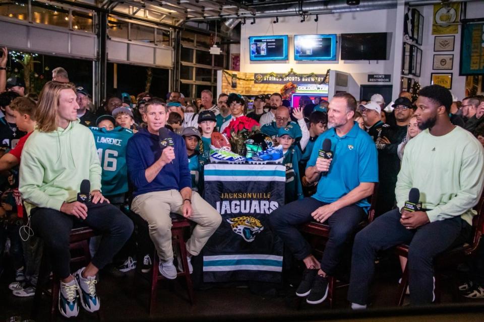 TV shows such as "Jaguars All Access" on Thursday nights at Strings draw big crowds to watch Jaguars such as Trevor Lawrence (far left) and Josh Allen (far right) talking with hosts Brent Martineau (second from the left) and Jeff Lageman (second from the right).