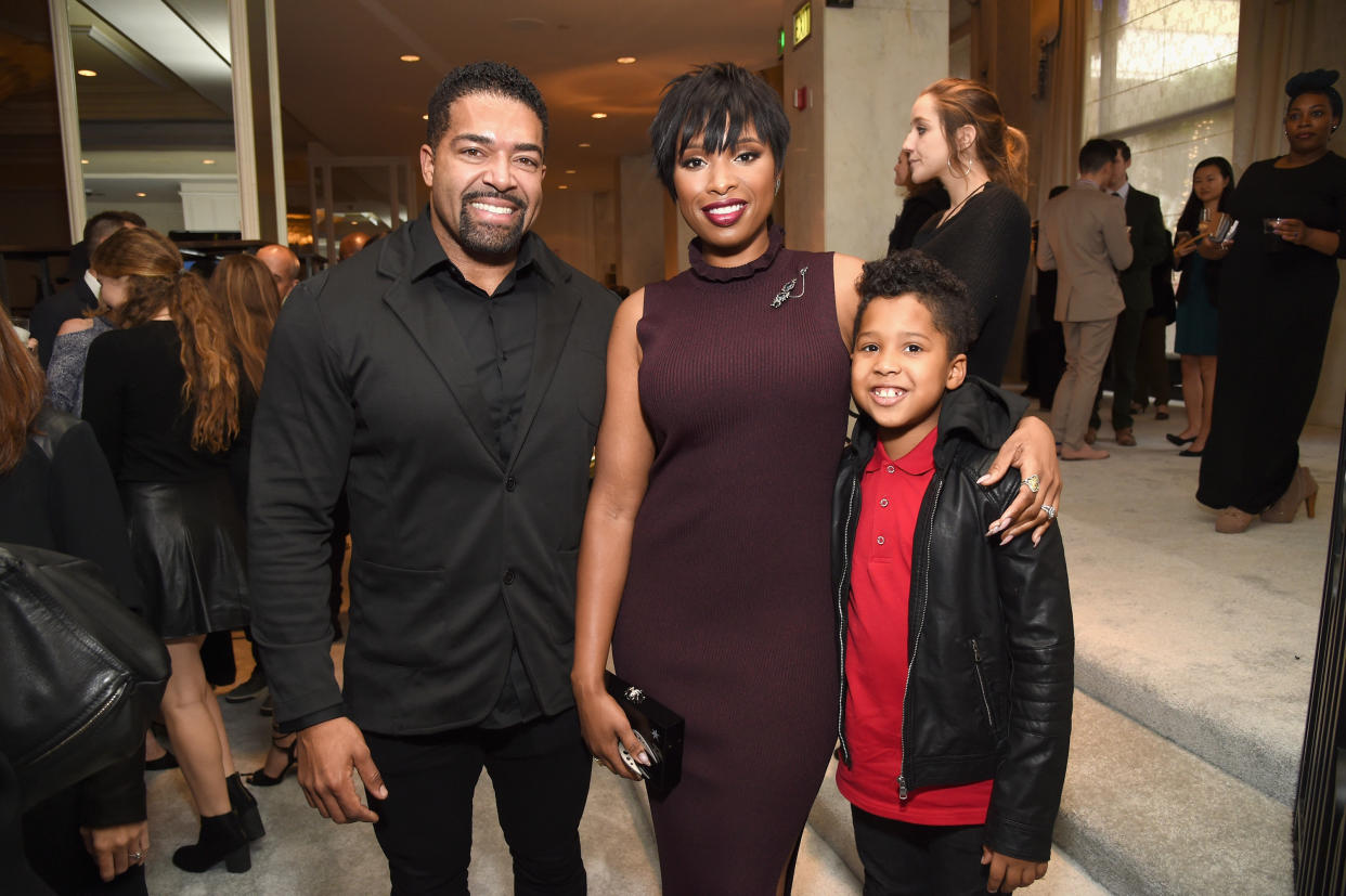 Hudson and Otunga, pictured with their son in December 2016, have been together about 10 years. (Photo: Michael Kovac via Getty Images)