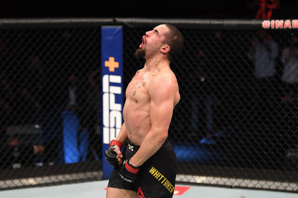 ABU DHABI, UNITED ARAB EMIRATES - OCTOBER 25:  Robert Whittaker of Australia reacts after the conclusion of his middleweight bout against Jared Cannonier during the UFC 254 event on October 25, 2020 on UFC Fight Island, Abu Dhabi, United Arab Emirates. (Photo by Josh Hedges/Zuffa LLC via Getty Images)