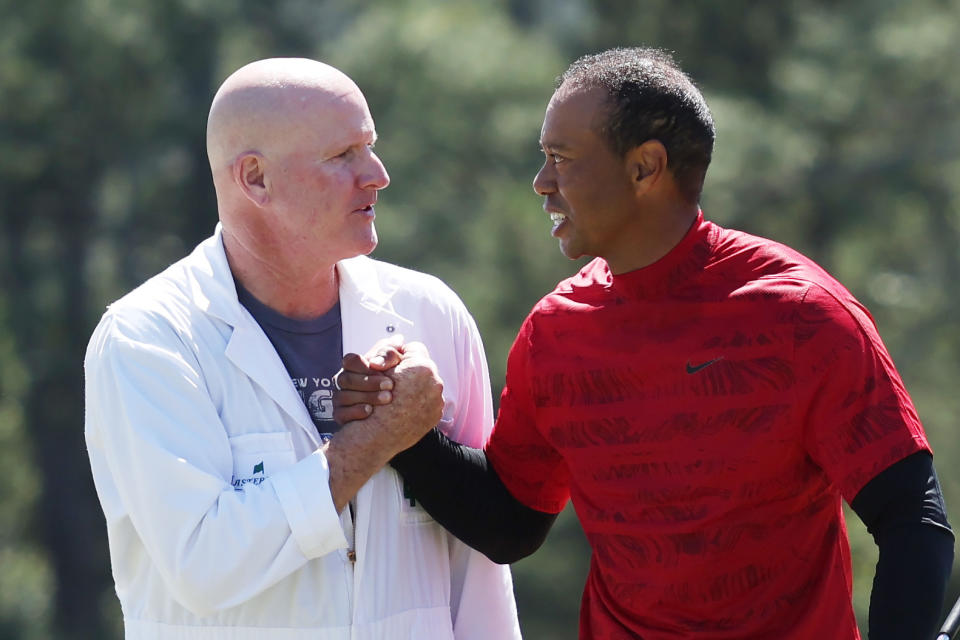 Tiger Woods and caddie Joe LaCava, pictured here shaking hands after the final round at the Masters.