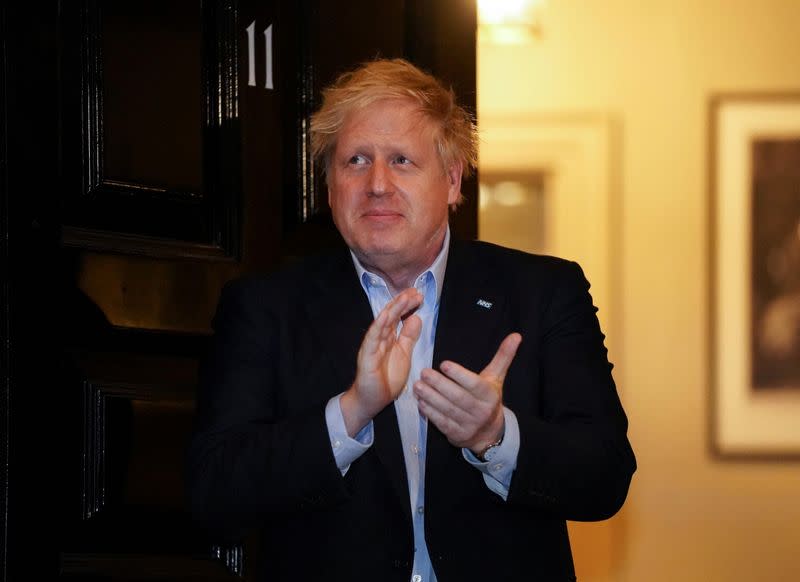 Britain's PM Johnson applauds in support of NHS outside 11 Downing, London