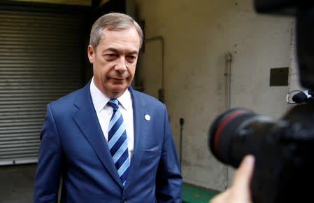 Britain's Brexit Party leader Nigel Farage leaves a TV studio in Westminster, London