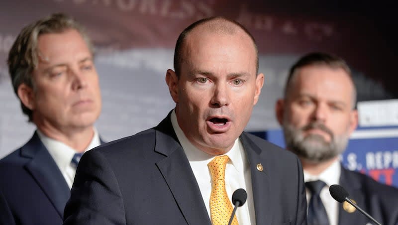 Sen. Mike Lee, R-Utah, center, speaks during a news conference on border security and funding on Capitol Hill Wednesday, Jan. 10, 2024, as Rep. Cory Mills, R-Fla., right, and Rep. Andrew Ogles, R-Tenn., left, listen in Washington.