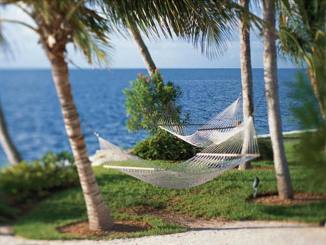 Hammocks at Grove Isle prior to construction of Vita, a new seven-story condo building going up in front of Building 3.