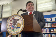 FILE - Illinois Gov. J.B. Pritzker speaks at Springfield High School in Springfield, Ill., April 27, 2022. Pritzker, along with the Democratic Governors Association, has spent millions trying to ensure Richard Irvin isn’t the GOP nominee. (AP Photo/John O'Connor, File)