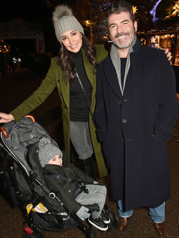 <p>David M. Benett/Dave Benett/Getty</p> Simon Cowell with Lauren Silverman and son Eric Cowell attend a VIP Preview of Hyde Park's Winter Wonderland 2016