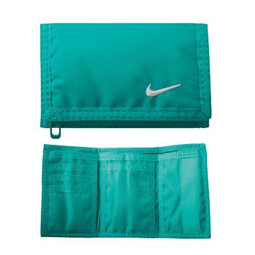 <p><strong>Nike</strong></p><p>amazon.com</p><p><strong>$39.00</strong></p><p><a href="https://www.amazon.com/dp/B01AK22V18?tag=syn-yahoo-20&ascsubtag=%5Bartid%7C10050.g.29775459%5Bsrc%7Cyahoo-us" rel="nofollow noopener" target="_blank" data-ylk="slk:Shop Now;elm:context_link;itc:0;sec:content-canvas" class="link ">Shop Now</a></p><p>This slim trifold design is a good starter wallet for a young man. Bonus—it's waterproof!</p>