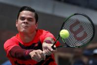 Milos Raonic of Canada hits a return to Fernando Verdasco of Spain during their match at the U.S. Open Championships tennis tournament in New York, September 2, 2015. REUTERS/Mike Segar