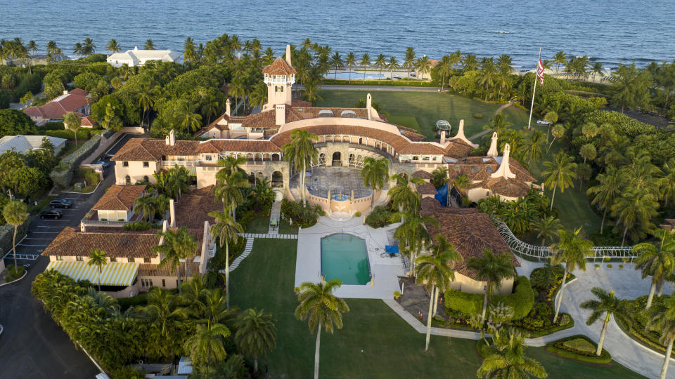 FILE - An aerial view of former President Donald Trump's Mar-a-Lago estate is seen, Aug. 10, 2022, in Palm Beach, Fla. Lawyers for Donald Trump were in court Friday, Dec. 9, for sealed arguments as part of the ongoing investigation into the presence of classified information at the former president's Florida estate. (AP Photo/Steve Helber, File)