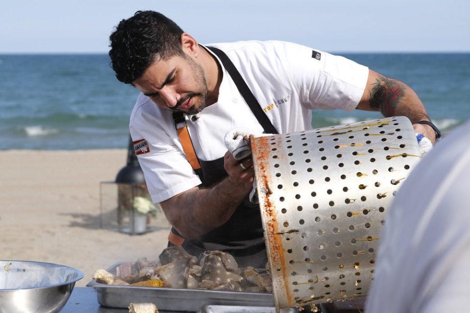 Dining critic Rachel Bernhard tasted "Top Chef: Wisconsin" contestant Manny's dish, a Mexican boil served with chips and guacamole and Mexican rice.