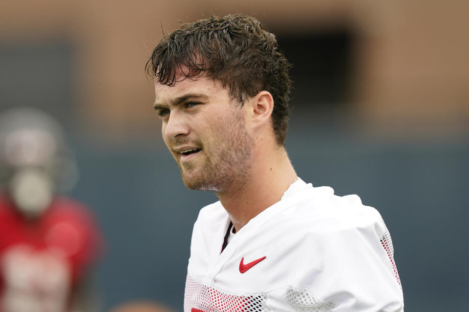 FILE - Mississippi quarterback Luke Altmyer (7) looks downfield during NCAA college football practice on Aug. 3, 2022, in Oxford, Miss. Altmyer was the backup last season but replaced an injured Matt Corral in the Sugar Bowl. (AP Photo/Rogelio V. Solis, File)