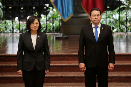 Taiwan's President Tsai Ing-wen (L) and her Guatemalan counterpart Jimmy Morales arrive to the Presidential Palace in Guatemala City, Guatemala January 11, 2017. REUTERS/Luis Echeverria