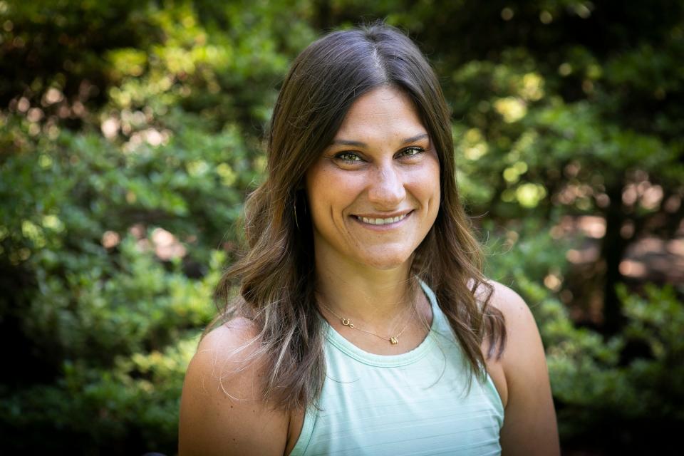 Molly Schneider, of Norwood, photographed in Lindner Park, on Monday, August 3. In 2018, Schneider fell off a 3-foot tall porch railing that left her with a spinal cord injury. She has always led a very active lifestyle and still does. On Friday, August 7, she will be rappelling in her wheelchair, down the Chase Tower, in Columbus, to raise money and awareness for child sex trafficking.