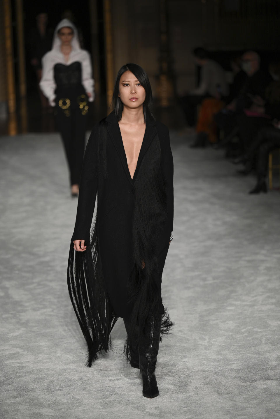 Models walk the runway at the Christian Siriano Fall/Winter 2021 at Gotham Hall during New York Fashion Week on Thursday, Feb. 25, 2021, in New York. (Photo by Evan Agostini/Invision/AP)