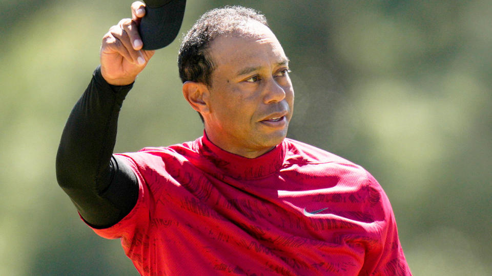 Pictured here, Tiger Woods saluting fans at the Masters. 