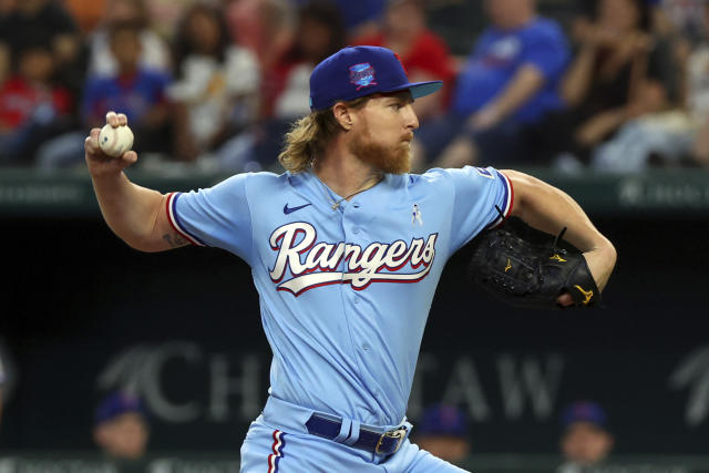 Texas Rangers' Jonah Heim runs the bases after a solo home run in the fifth  inning against the Toronto Blue Jays in a baseball game, Sunday, June 18,  2023, in Arlington, Texas. (