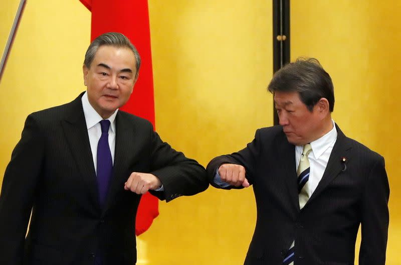 China's State Councilor and Foreign Minister Wang Yi meets with his Japanese counterpart Toshimitsu Motegi in Tokyo