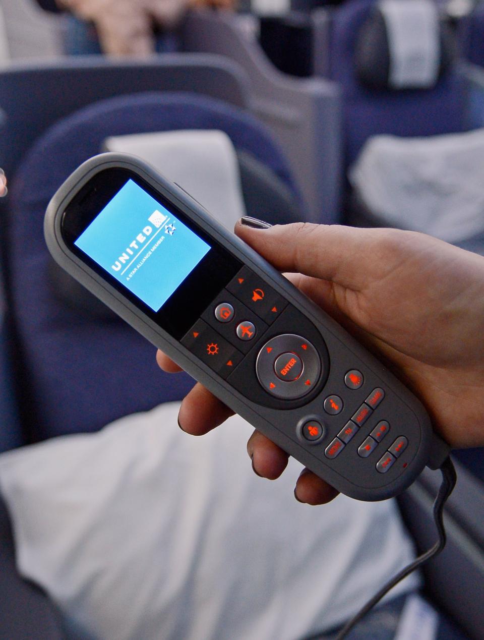 LOS ANGELES, CA - NOVEMBER 30: A joystick for the personal entertainment systems is shown on the United Airlines Boeing 787 Dreamliner at Los Angeles International Airport on November 30, 2012 in Los Angeles, California. In January the new jet is scheduled to begin flying daily non-stop between Los Angeles International airport and Japan's Narita International Airport and later to Shanghai staring in March. The new Boeing 787 Dreamliner will accommodate 219 travelers with 36 seat in United Business First, 70 seats in Economy Plus and 113 in Economy Class. The carbon-fiber composite material that makes up more than 50 percent of the 787 makes the plane jet and more fuel-efficient. (Photo by Kevork Djansezian/Getty Images)