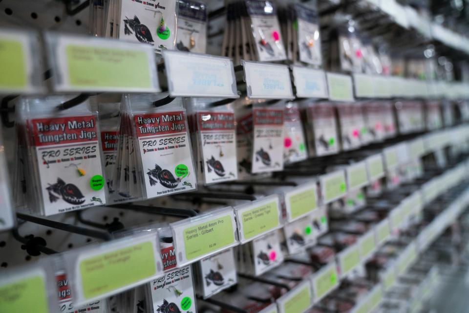 Sportsmen's Direct's shelves are full of tungsten jigs used for ice fishing on Feb. 15, 2024. With the lack of ice cover this year, the tackle isn't selling the way the store would expect.
