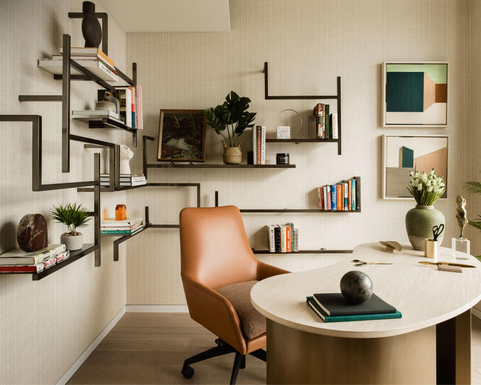 <p> Seek out pieces of vintage or mid-century office furniture and lighting for a characterful result. Don&#x2019;t feel beholden to one era, a mix of styles will look more natural and collated. In this home office scheme, interior designer Charu Gandhi of&#xA0;Elicyon chose a modular joinery piece from the 1960s to create a statement and added contemporary pieces of art which inject colour and interest. </p> <p> &#x2018;When adding art to an office, think about the kind of medium, scale and style of art you&#x2019;d like whilst walking around the space &#x2013; never decide off-plan,&#x2019; recommends Camilla Clarke, creative director at&#xA0;Albion Nord.&#xA0; </p> <p> &#x2018;This way you will feel the natural spots for art to be. This may be next to a window or vista through the house. Remember art doesn&#x2019;t always need to be hung on the center of the wall; it can rest on top of desks or layered next to sculptures or on bookshelves and joinery.&#x2019; </p>