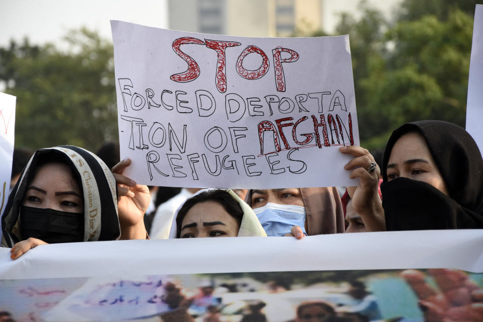 A social group, Aurat March, hold signs during a demonstration against Pakistani government, in Islamabad, Pakistan, Sunday, Oct. 29, 2023. Pakistan says it has recently announced plans to deport all migrants who are in the country illegally, including 1.7 million Afghans, who will be implemented in a "phased and orderly manner." (AP Photo/W.K. Yousafzai)